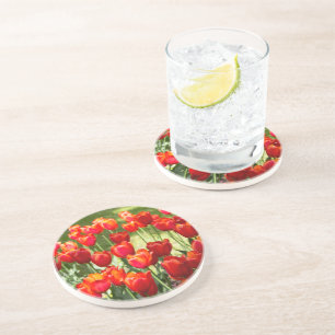 Large field of red tulips coaster