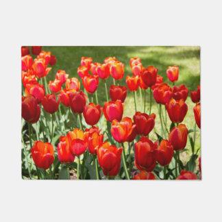 Large field of red tulips doormat