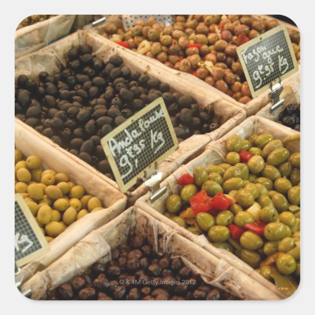 Large open boxes of black and green olives for square sticker (Front)