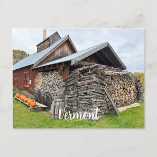 Large pile of stacked wood postcard
