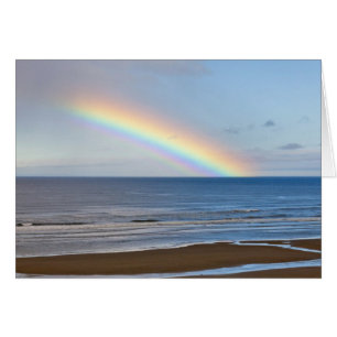 Large rainbow over the Pacific Ocean at