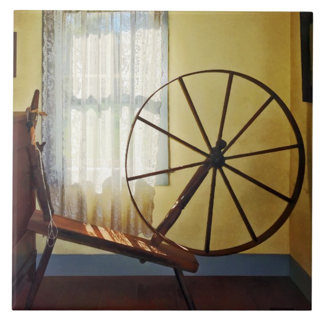 Large Spinning Wheel Near Lace Curtain Tile (Front)