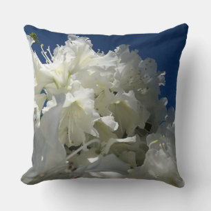 large white blossom against blue sky cushion