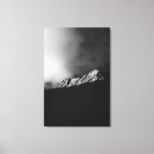 Last sun rays on the mountain in black and white canvas print (Front)