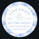 Last Toast On The Coast Beach Coastal Bachelorette Classic Round Sticker<br><div class="desc">Introducing our "Last Toast On The Coast" Beach Coastal Bachelorette Sticker, the perfect accent for your seaside celebration! These stickers feature a charming coastal-inspired design, setting the tone for a memorable beach bachelorette party. With their durable adhesive backing, they can be easily applied to party favours, decorations, and more, adding...</div>