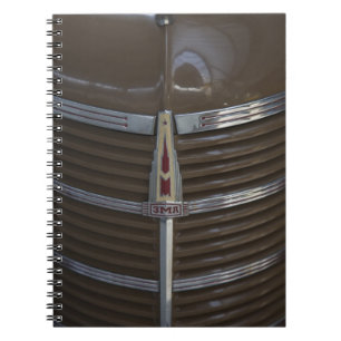 Latvia, Riga, Riga Motor Museum, hood ornament Notebook