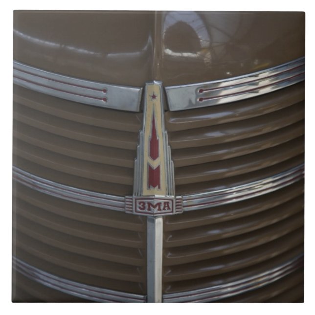 Latvia, Riga, Riga Motor Museum, hood ornament Tile (Front)