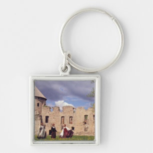 Latvian girls in traditional dress, singing key ring