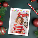 Laughing All The Way Rainbow Kids Christmas Photo Holiday Postcard<br><div class="desc">Beautiful,  colourful full photo Christmas postcard with Laughing All the Way in pretty rainbow cursive script. Personalise with your favourite vertical family photograph of your smiling child above your name or custom greeting in red. Fun and cheerful holiday postcards.</div>