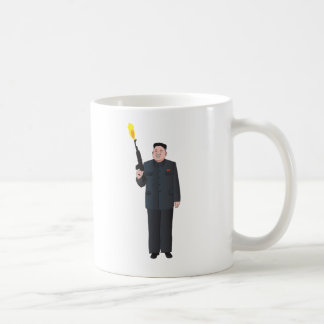 Laughing Kim Jong-un firing a gun into the air Coffee Mug