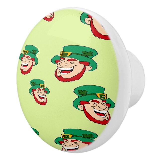 Laughing leprechauns on light green ceramic knob (Right)