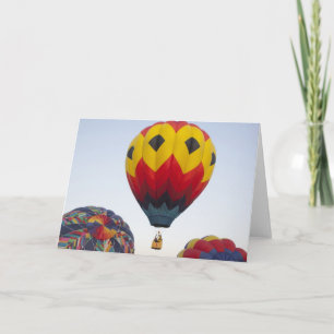 Launching hot air balloons holiday card