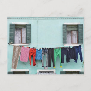 Laundry drying by clothesline, postcard