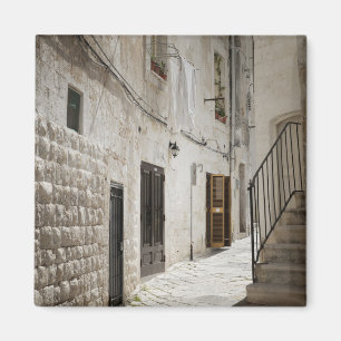 Laundry hanging to dry in an alley in Italy Magnet