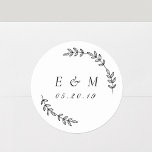 Laurel Wreath Wedding Monogram Classic Round Sticker<br><div class="desc">Custom-designed circular monogrammed labels/stickers featuring elegant hand-drawn laurel wreath. Personalize with couple/bride and groom's initials/monogram and wedding date. These modern and elegant stickers/labels are perfect for adding a touch of style to wedding envelopes,  invitations,  gifts,  favors,  and more!</div>