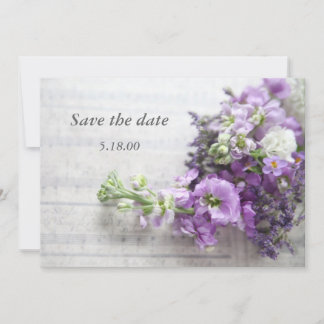 lavender-coloured flowers on music save the date