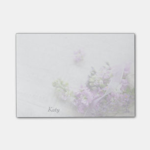 Lavender-coloured flowers on old music post-it notes