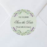 Lavender sage green wedding Save the Date Classic Round Sticker<br><div class="desc">A modern sage green background decorated with lavender flowers and eucalyptus greenery.  Personalise and add your names and wedding date.</div>
