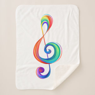Layered rainbow treble clef sherpa blanket