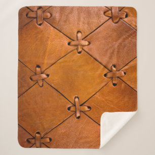 Leather texture, natural selvage detail. sherpa blanket