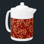 Leaves & Acorns Autumn Colours<br><div class="desc">Stylish teapot features watercolor illustrations of autumn coloured leaves and acorns on dark red background</div>