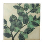 Leaves and Branches on Cream Background Tile<br><div class="desc">Vibrant green leaves and branches rest on a cream background in this print by Jennifer Goldberger. As the season change the colours on these leaves stay the same, bringing a little consistency into your life.</div>