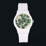 Leaves and Branches on Cream Background Watch<br><div class="desc">Vibrant green leaves and branches rest on a cream background in this print by Jennifer Goldberger. As the season change the colours on these leaves stay the same,  bringing a little consistency into your life.</div>