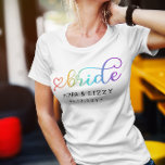 Left Heart Rainbow Bride LGBT Wedding T-Shirt<br><div class="desc">Cute bride tee for a lesbian bride with a cute heart-adorned script filled with rainbow colours. Add the brides' names and wedding date.</div>