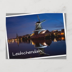 Leidschendam windmill with reflection at night postcard