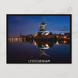 Leidschendam windmill with reflection at night postcard