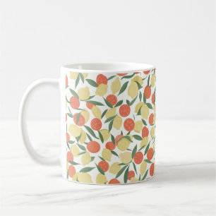 Lemon and orange fruits with leaves on white backg coffee mug