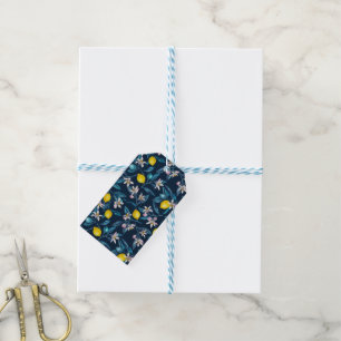 Lemon branches with blossoms and fruit on blue gift tags