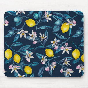 Lemon branches with blossoms and fruit on blue mouse mat