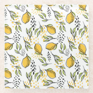 Lemon, green branches: abstract pattern. glass coaster