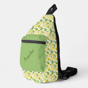 Lemons and Limes on a Green Background Sling Bag