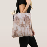 Leonardo da Vinci's Human Anatomy Skeleton Bones Tote Bag<br><div class="desc">Study of Skeletons (c. 1510) by artist Leonardo da Vinci (1452-1519) is a vintage Renaissance Era fine art science painting. A drawing featuring several skeletons of a healthy human body from a couple of views of ribs, the ribcage, arms, legs, femurs, tibia, pelvic bones, spine, spinal column, etc. A great...</div>