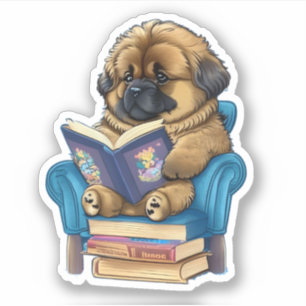 Leonberger Puppy reading a book