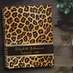 Leopard brown bronze pattern gold foil stripe name planner<br><div class="desc">Get Organised in Style with Our Leopard Brown Bronze Pattern Gold Foil Stripe Name Planner! Elevate your planning game with this chic and sophisticated planner. Featuring a stunning brown bronze leopard skin pattern, a luxurious gold foil stripe, and the option to personalise with your name in elegant gold script typography....</div>