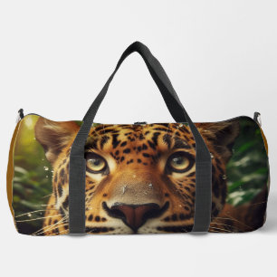 Leopard Stares While Lapping Water in Jungle  Duffle Bag