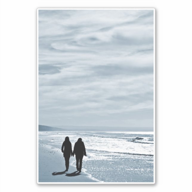 Lesbian Couple Walks Side by Side on a Sandy Beach (Front)