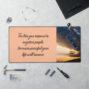 Less you respond to negative people sunset peach desk mat