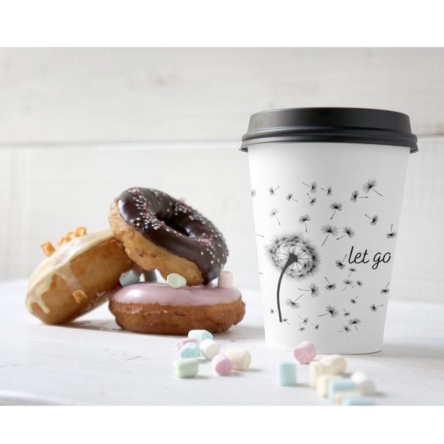Let go, dandelion seed flowing in the wind   paper cups (Creator Uploaded)