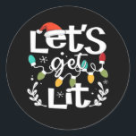 Let's Get Lit Drinking Santa Hat Christmas Lights  Classic Round Sticker<br><div class="desc">Let's Get Lit Drinking Santa Hat Christmas Lights Essential: A festive pun design featuring Santa hats,  drinks,  and lights. Perfect for parties. Fun,  witty,  and seasonal.</div>