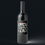 Let's Get Lit Drinking Santa Hat Christmas Lights  Wine Label<br><div class="desc">Let's Get Lit Drinking Santa Hat Christmas Lights Essential: A festive pun design featuring Santa hats,  drinks,  and lights. Perfect for parties. Fun,  witty,  and seasonal.</div>