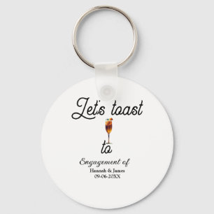 Let's toast to engagement party name date glass key ring
