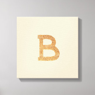 Letter B on tan coloured stretched canvas