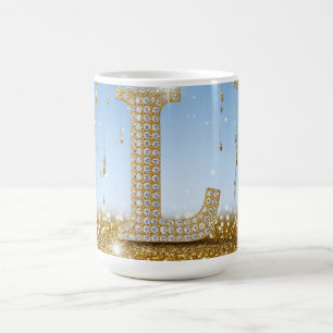 Letter L on Gold Glitter Background With Sparkling Coffee Mug