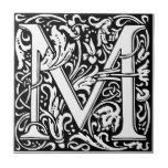 Letter M art nouveau black and white Tile<br><div class="desc">Available in 2 sizes, this custom-made ceramic tile is part of our match any colour Tile Series. Not intended for outdoor use.We suggest that you order one tile to review before placing a large order. This simple and modern design tile will go with any colour scheme. You could use it...</div>