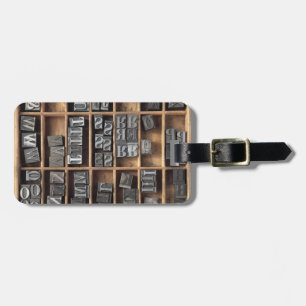Letterpress lead type in a case luggage tag