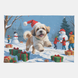 Lhasa Apso Running in Snow with Christmas Hat Tea Towel